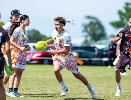 Player running with the ball